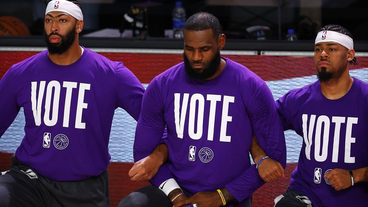 Anthony Davis, LeBron James and Quinn Cook