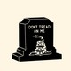 Illustration of a gravestone with "Don't tread on me" written on it