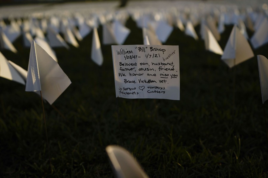 A note is seen on a white flag.
