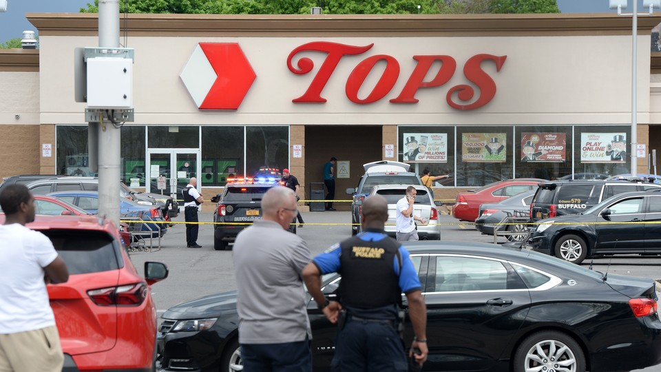 A crime scene at a supermarket in Buffalo, New York, where a gunman allegedly killed at least 10 people.