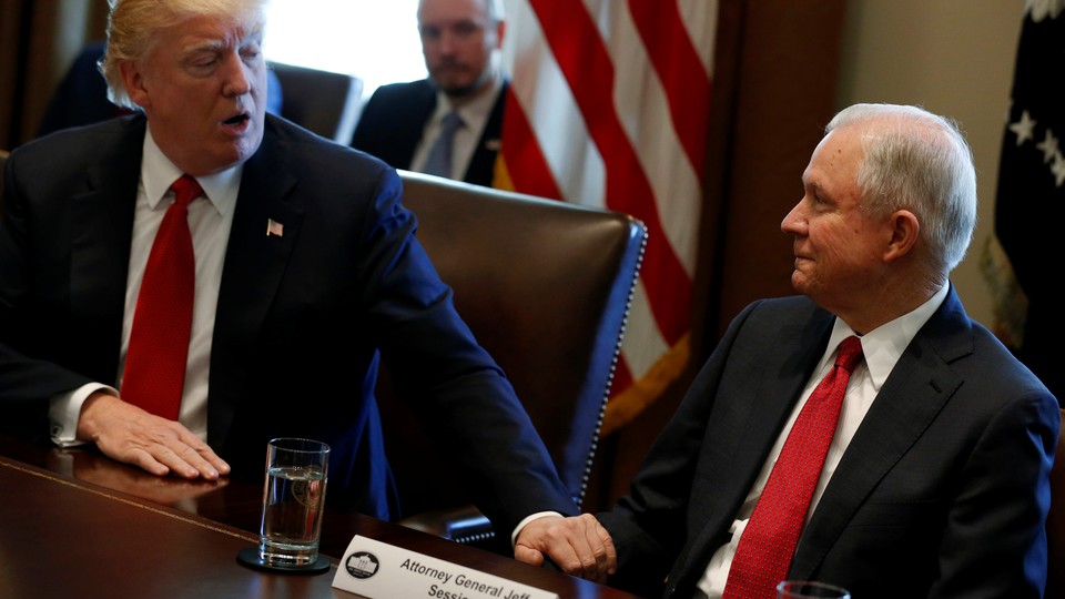 President Trump and Attorney General Jeff Sessions at a Cabinet meeting in March
