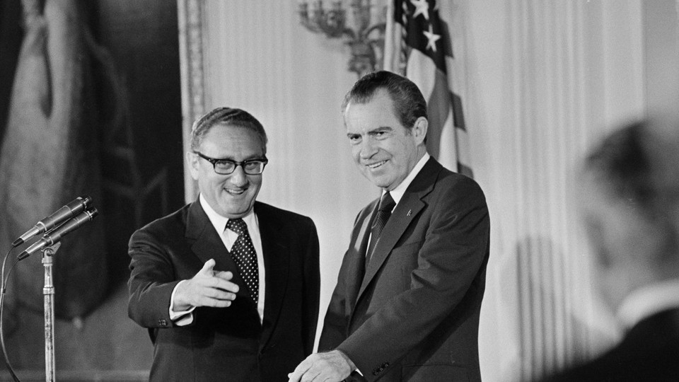 Secretary of State Henry Kissinger and President Richard Nixon in the East Room of the White House.