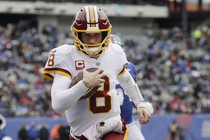 Washington Redskins quarterback Kirk Cousins rushes for a touchdown