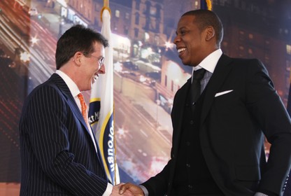 Robert Diamond shakes hands with Jay-Z