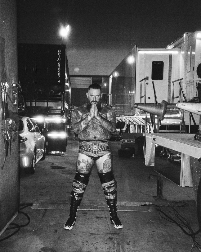 A black and white photograph of Brody King at night after a fight
