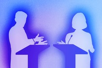 Silhouettes of two people debating