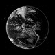 The Earth in grayscale, against a black background