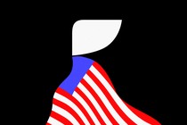 Silhouette of a handmaid draped with an American flag