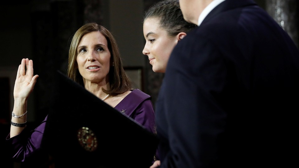 Martha McSally participates in a mock swearing-in during the opening day of the 116th Congress on January 3, 2019.