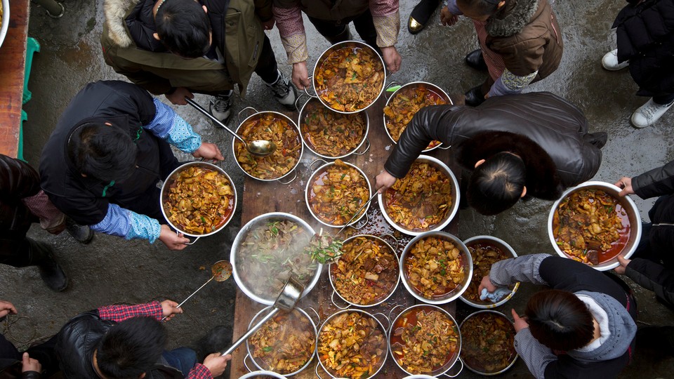 A bird's-eye view of an outdoor feast in China