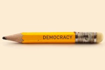 An illustration of a pencil that is engraved with the word "democracy"