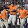 Houston Astros players celebrate after a two-run home run against the Los Angeles Dodgers in the second inning in game seven of the 2017 World Series at Dodger Stadium.