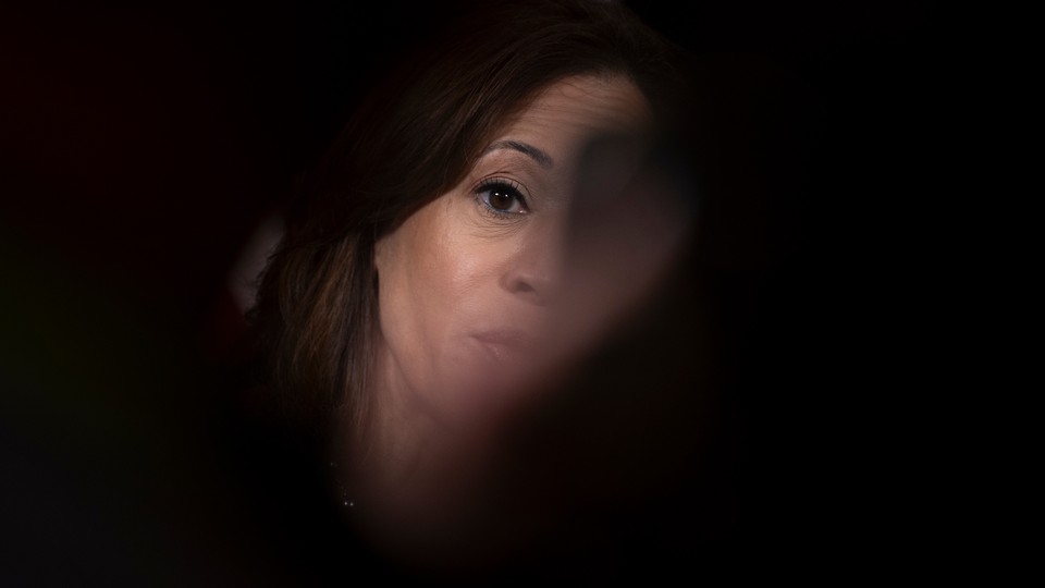 A blurred image of Kamala Harris