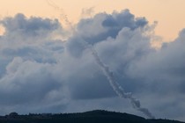 A photograph taken from the southern Lebanese area of Marjeyoun shows trails of rockets fired from Lebanon towards Israel