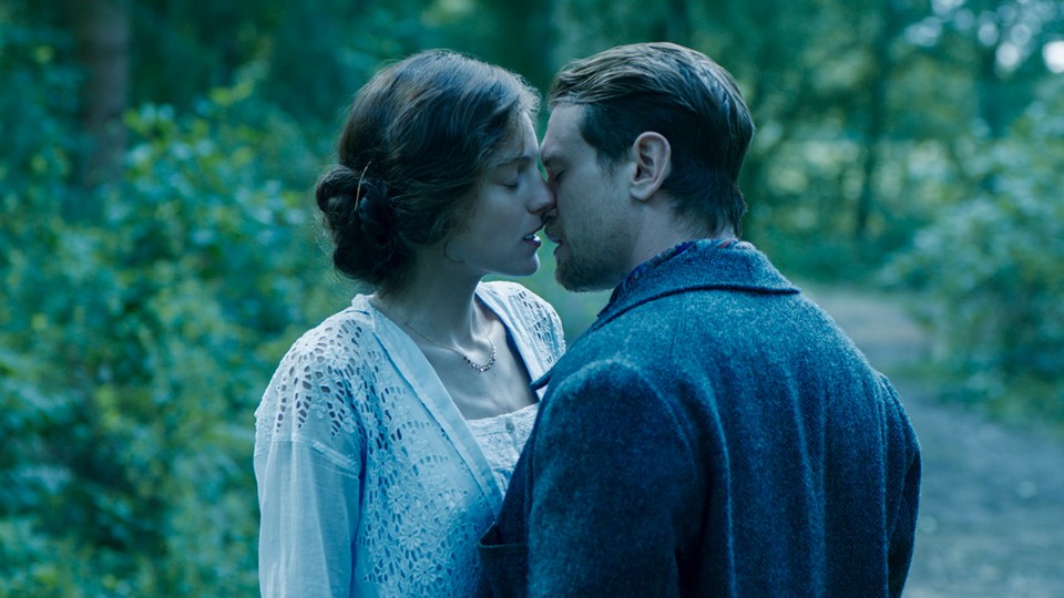 Emma Corrin and Jack O’Connell mid-embrace in "Lady Chatterley's Lover"