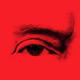 A photo-illustration of Trump's eyes with a red overlay