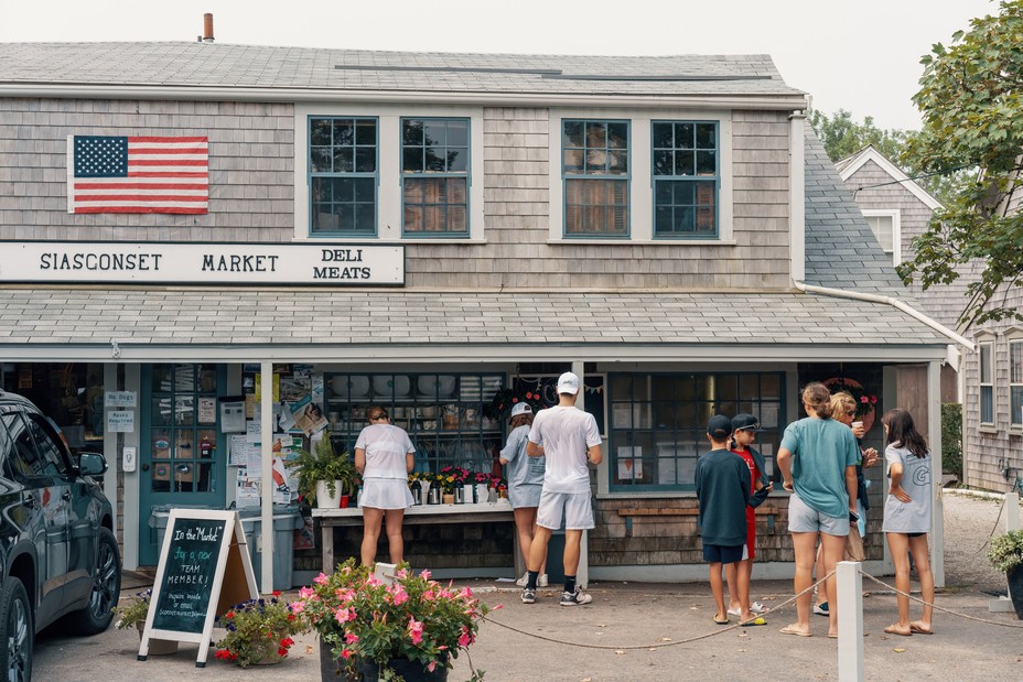 Customers at a market in the Sconset area of Nantucket. The neighborhood was traditionally a minority stronghold on the island before being gentrified in recent years.