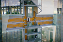 A design model for an elevator that can move vertically and horizontally to connect buildings.