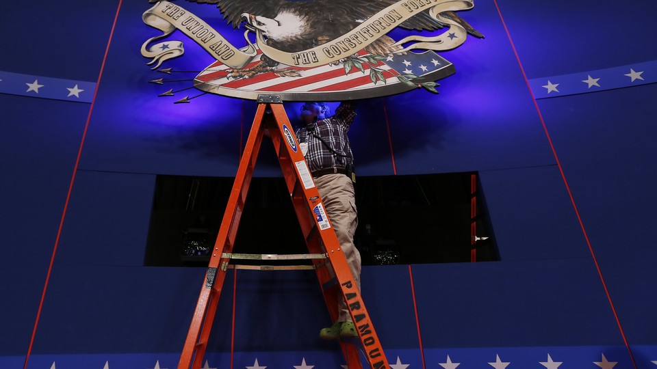A technician prepares a presidential debate stage in 2012.