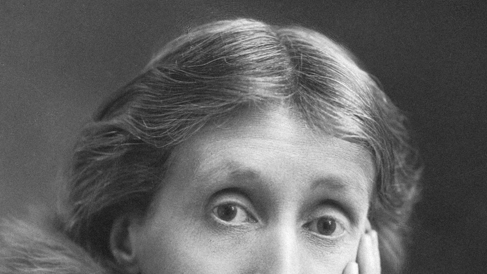 A black and white photograph portrait of Virginia Woolf in older age, cropped to just above her nose, showing her furrowed brow