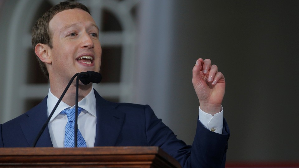 Mark Zuckerberg stands at a podium.