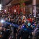 Riot police respond to demonstrators in Hong Kong protesting against a plan to use new public housing as a possible coronavirus quarantine facility.