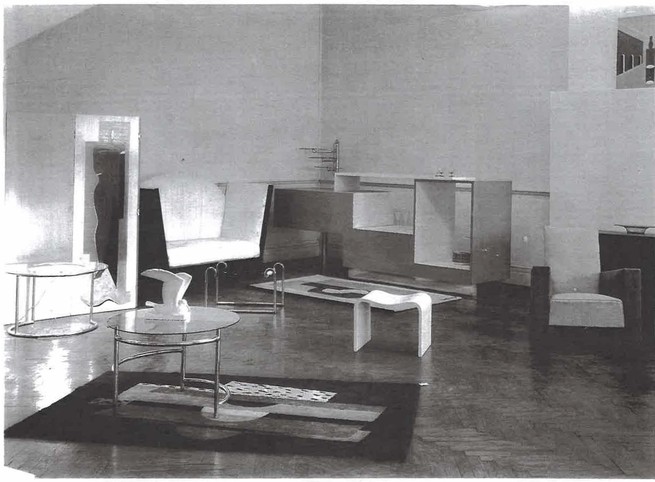 Bacon's studio with tables and a rug