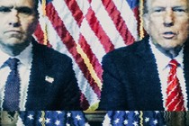 Todd Blanche and Donald Trump sit next to each other in front of American flags.