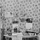 A black-and-white photo of a cluttered room