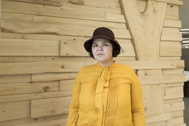 A student poses for a portrait photo. 