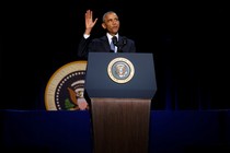 Obama waves at the end of his farewell address in Chicago