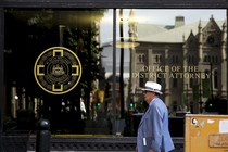A man walks by the district attorney's office in Philadelphia
