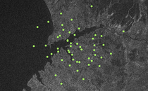 Green dots spread over a satellite view of Ukraine.