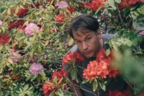 Mike Birbiglia in the bushes