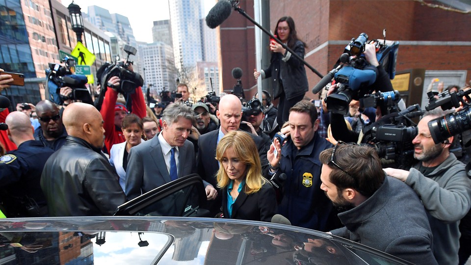 Felicity Huffman leaves a federal courthouse on April 3, 2019.