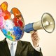 illustration of a man in a suit who has a paint palette for a head and is holding a megaphone