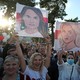 Women hold portraits of Sviatlana Tsikhanouskaya, Veronika Tsepkalo and Maria Kolesnikova at rally in support of Belarusian presidential candidatese Sviatlana Tsikhanouskaya.