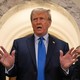 Former U.S. President Donald Trump, center, speaks to members of the media at the New York State Supreme Court on Monday, October 2, 2023.