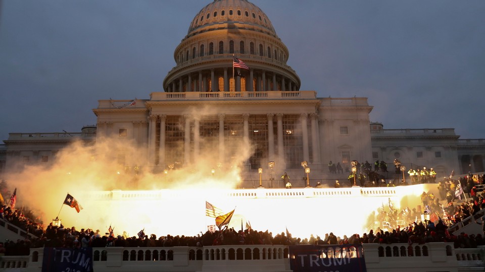 Protesters waving flags at the Capitol Building on January 6