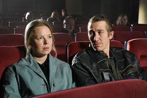 The protagonists of “Fallen Leaves” sitting in a movie theater