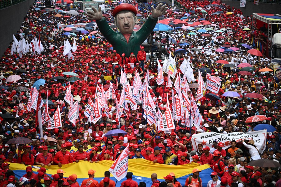 A large crowd marches in a progovernment parade in Venezuela.