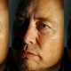 A close-up of Elon Musk's face