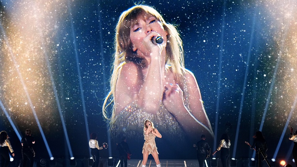 Taylor Swift onstage at a concert