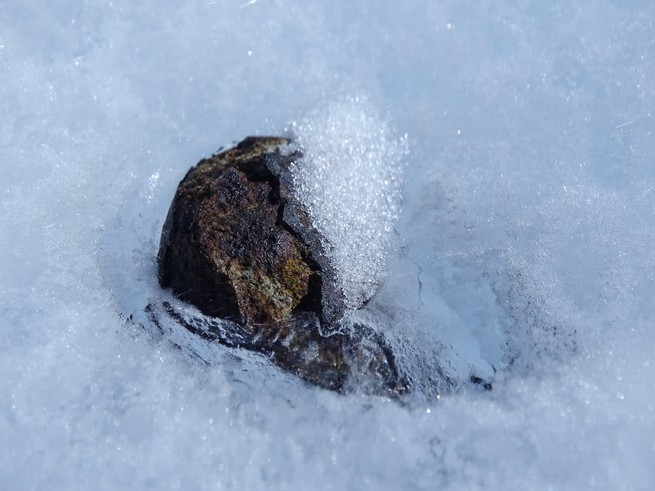 A meteorite sinking into ice (Katherine Joy)