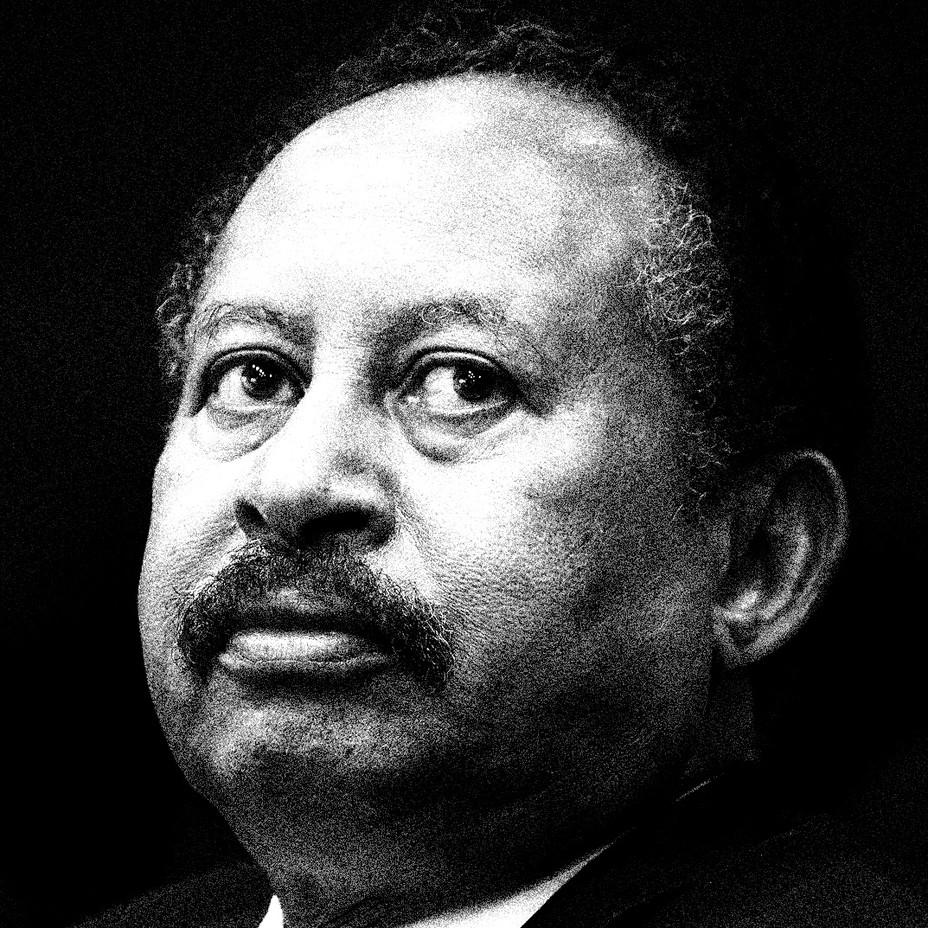 black-and-white photo of balding man with mustache looking up and to right