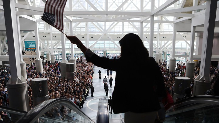 Thousands of people become naturalized citizens at this ceremony in Los Angeles in March.