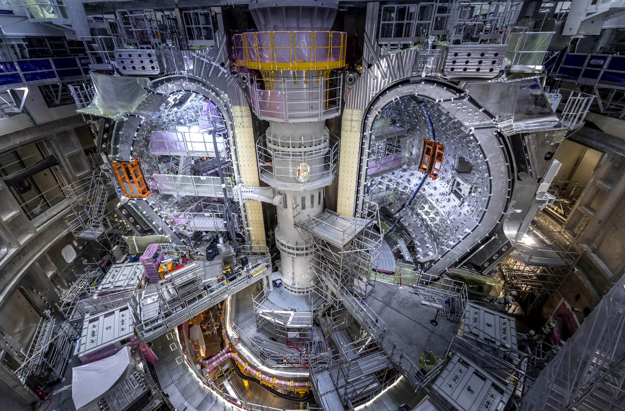 An overview of a complex partially completed torus-shaped fusion chamber