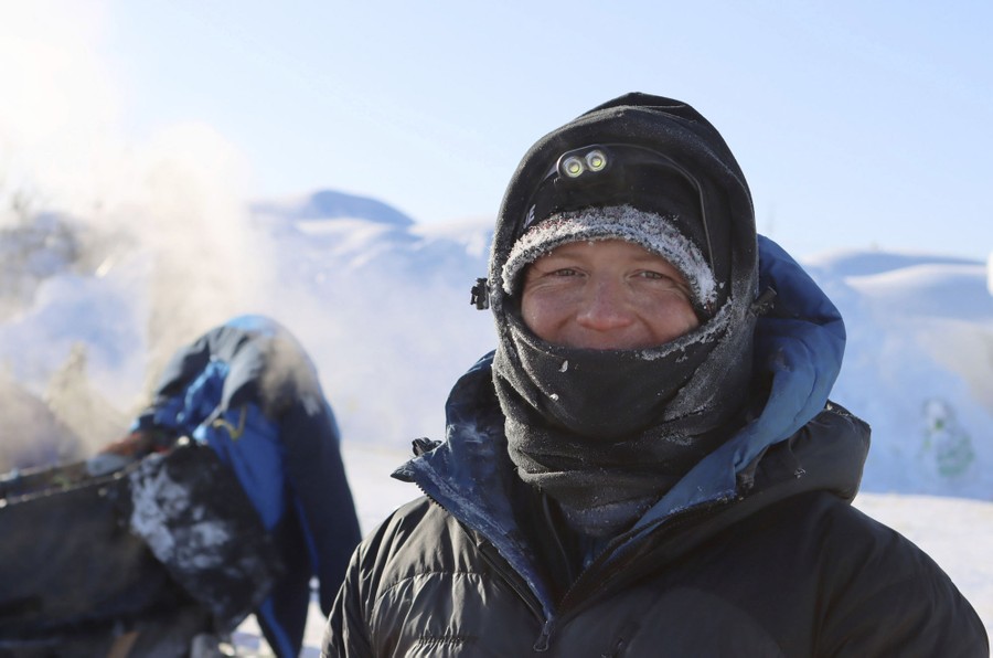 Portrait of a man wearing winter gear outside on a very cold day.