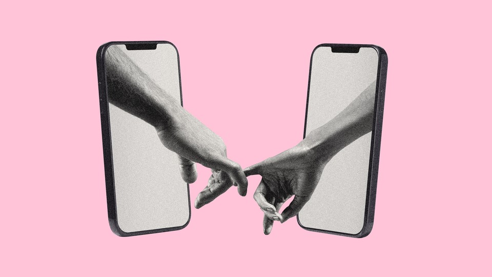 An image of two arms coming out of two phone screens, holding hands