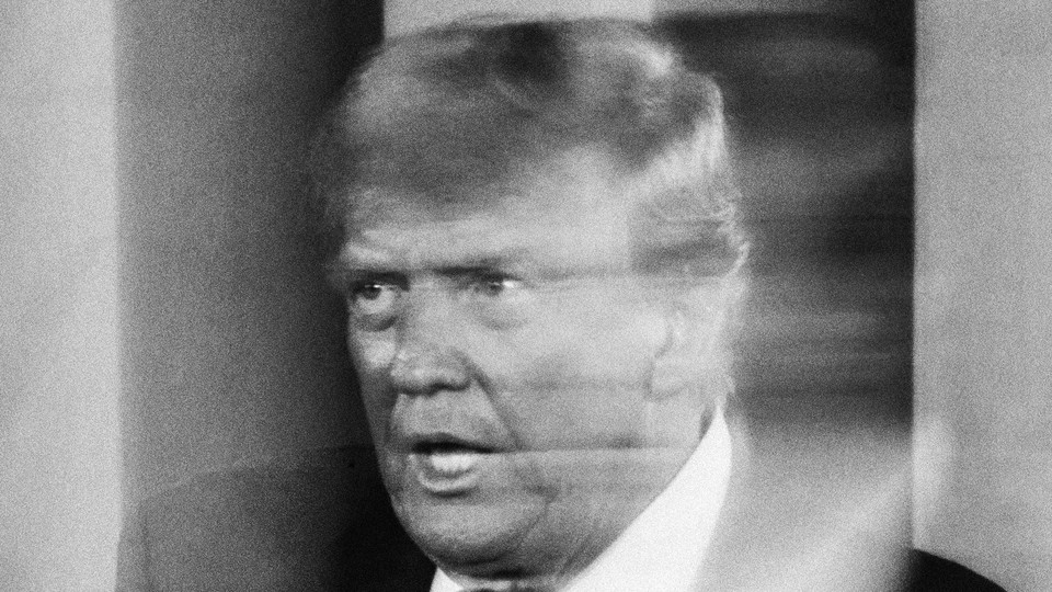 A slightly blurry black-and-white photograph of Donald Trump looking agitated